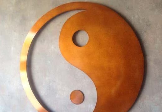 instead of a yin-yang symbol of black and white, this one uses the colors bronze with an open area to show the beige wall behind it. To indicate Shades Of Same .. Prove a way other than diametric